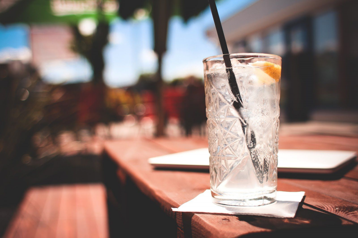 Drink on table with plastic straw