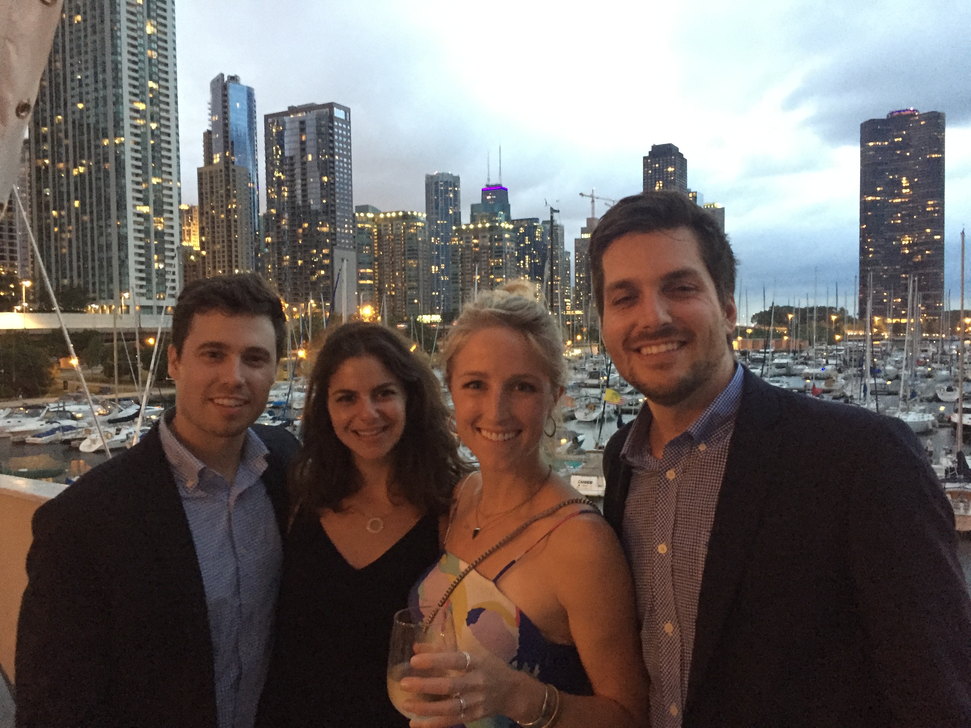 Jenny Solberg Katzman with husband Taylor Katzman (right) with friends (left) at the Great Blue Benefit in 2017.