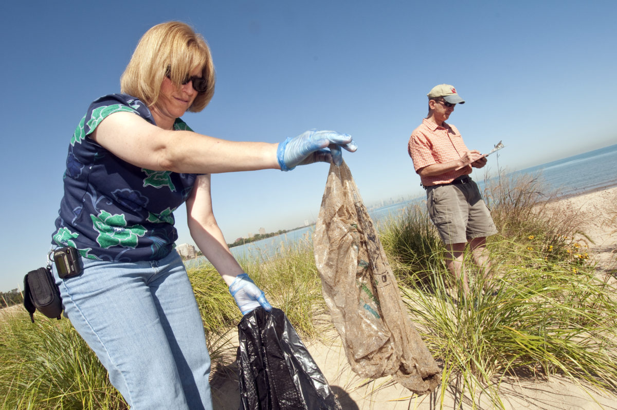 Adopt-a-Beach volunteers pick up trash