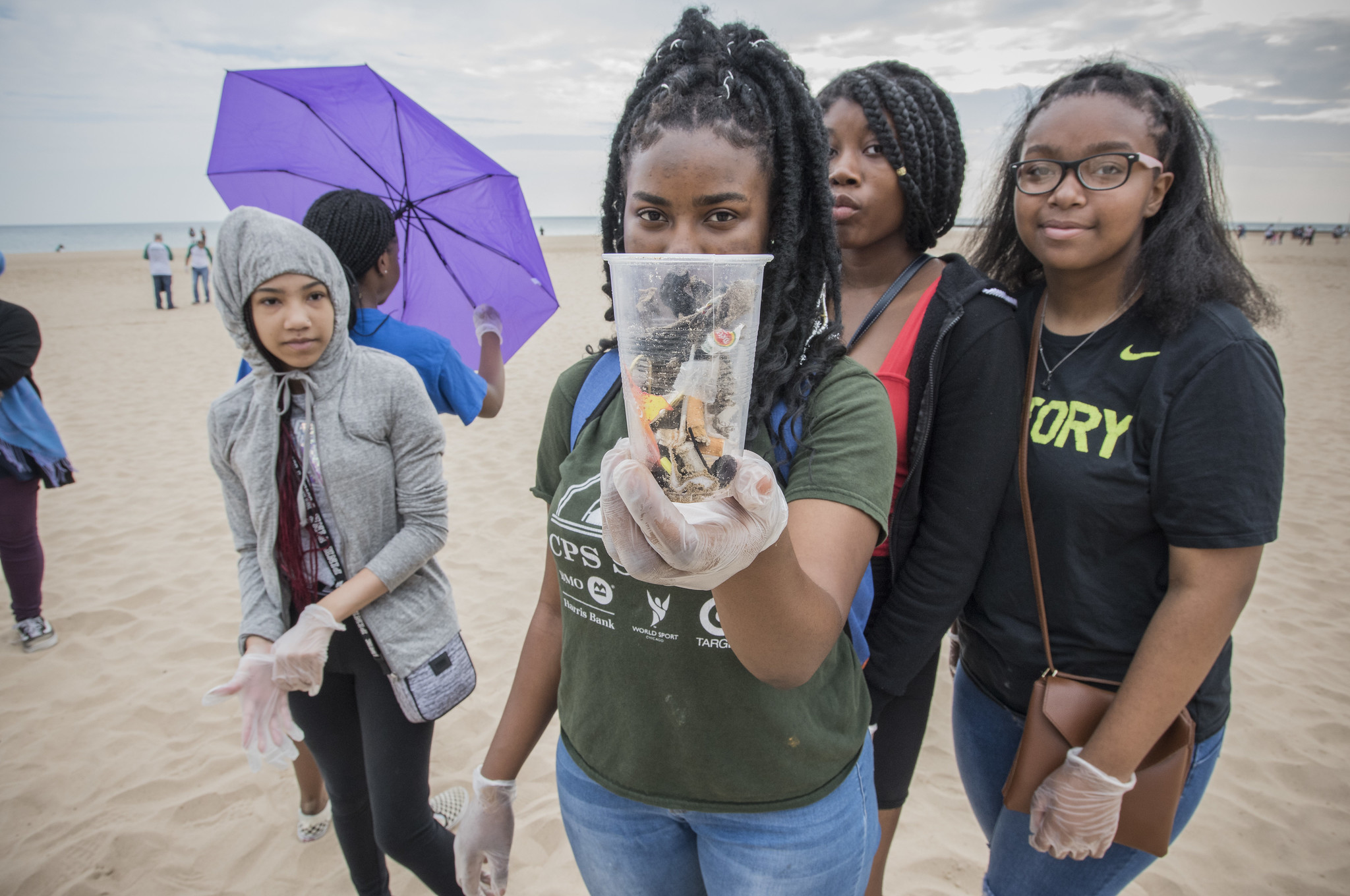 Senn High School students hold trash