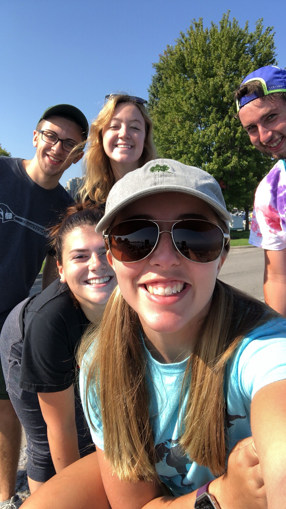 Group of young volunteers take selfie