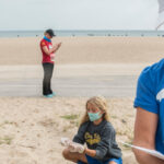 Volunteers clean a beach