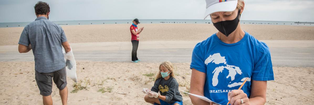 Volunteers clean a beach