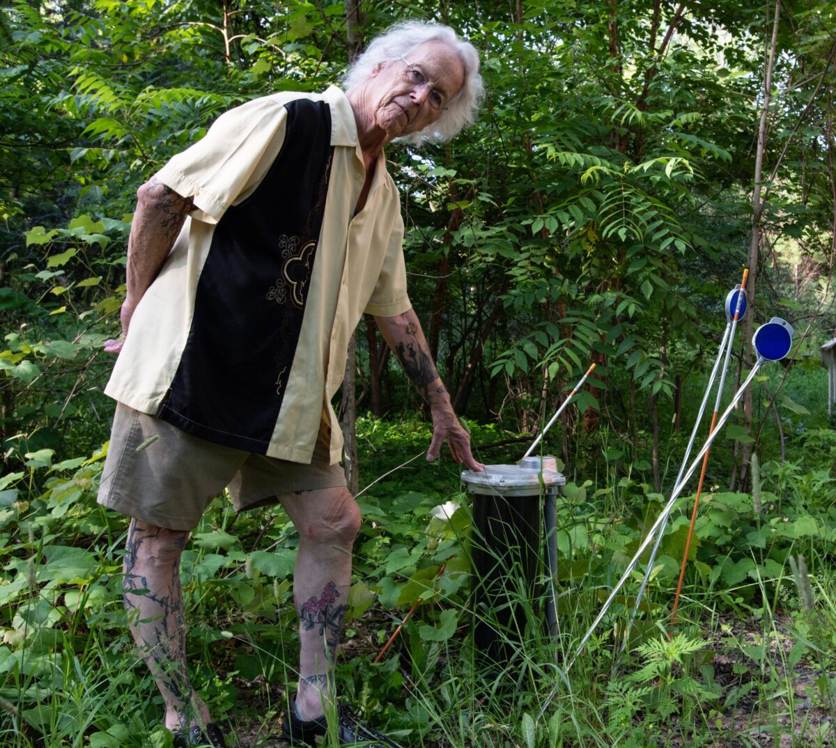 Mark Brueggeman of Nelsonville, Wisconsin with his well, which had to be dug to a depth of 197 feet and cost nearly twenty thousand dollars.