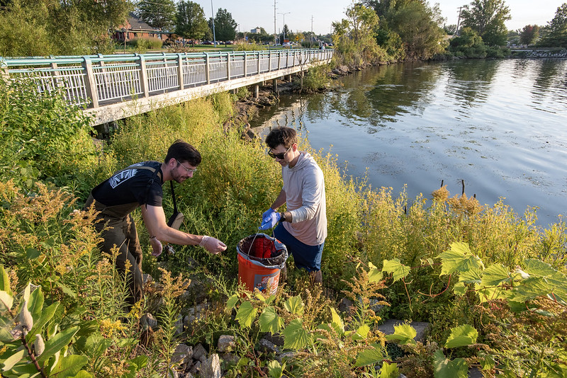 Alliance for the Great Lakes Adopt-a-Beach volunteers cleaning shoreline litter at Muskegon Lake.